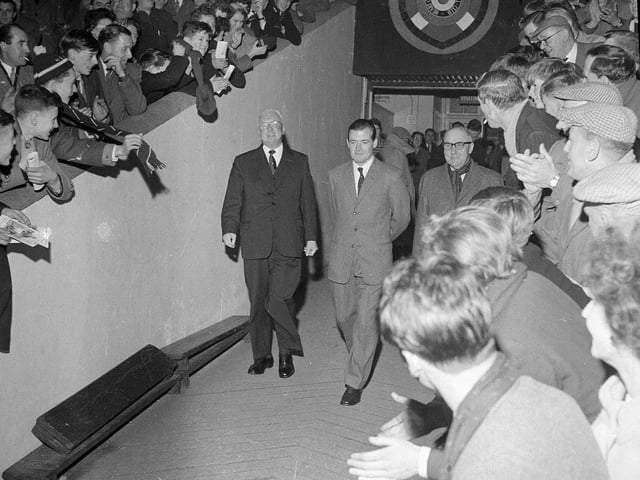 Willie Bauld is cheered by fans at his Hearts v Sheffield testimonial game at Tynecastle during his last season before retiring in 1962.