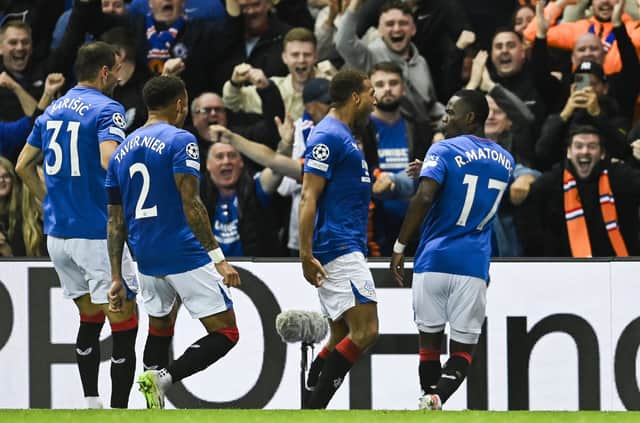 Rangers' Rabbi Matondo celebrates with Cyriel Dessers and other team-mates after his goal against PSV at Ibrox.