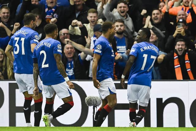 Rangers' Rabbi Matondo celebrates with Cyriel Dessers and other team-mates after his goal against PSV at Ibrox.