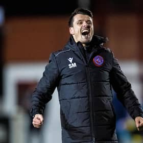 Steven Mackay celebrates Brora's shock 2-1 win over Hearts.