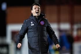 Steven Mackay celebrates Brora's shock 2-1 win over Hearts.