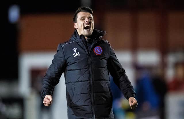 Steven Mackay celebrates Brora's shock 2-1 win over Hearts.