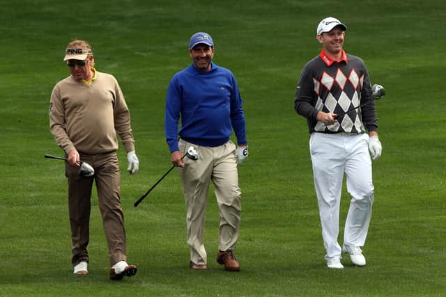 Stephen Gallacher pictured playing a pratice round with Spanish duo Miguel Angel Jimenez and Jose Maria Olazabal ahead of his debut in 2014. Picture: Andrew Redington/Getty Images.