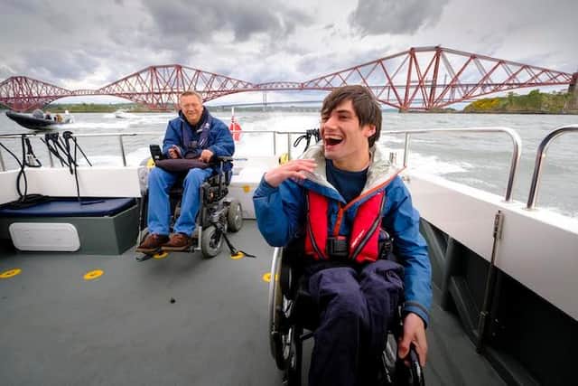 Keen local sailor Peter Finlayson, 25, from South Queensferry, who has cerebral palsy, also came onboard Wetwheels with his father Calum.