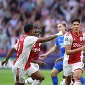 Ajax defender Edson Alvarez (middle) celebrates after opening the scoring against Rangers. (Photo by KENZO TRIBOUILLARD/AFP via Getty Images)
