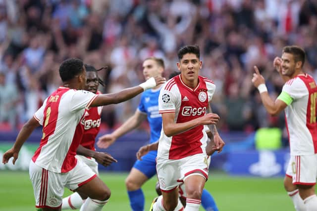 Ajax defender Edson Alvarez (middle) celebrates after opening the scoring against Rangers. (Photo by KENZO TRIBOUILLARD/AFP via Getty Images)