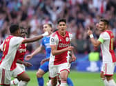 Ajax defender Edson Alvarez (middle) celebrates after opening the scoring against Rangers. (Photo by KENZO TRIBOUILLARD/AFP via Getty Images)