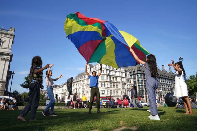 Children gather at Parliament Square in London to read their 'letters to the earth'  with 50 days to go until the UN Cop26 climate summit begins in Glasgow. Picture: Stefan Rousseau/PA Wire