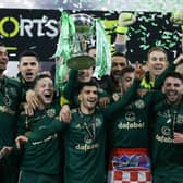 Celtic captain Callum McGregor lifts the Premier Sports Cup after Kyogo Furuhashi scored twice in a 2-1 win over Hibs at Hampden. (Photo by Craig Williamson / SNS Group)