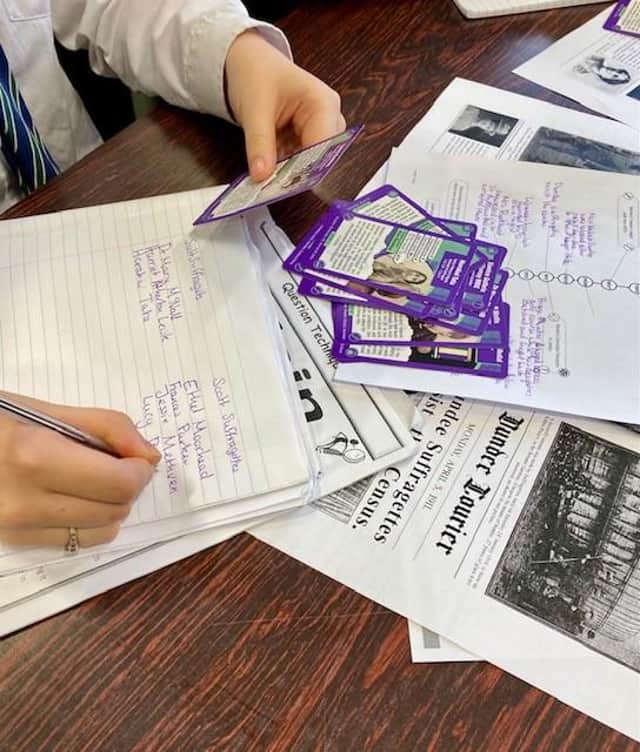 S4 students at Lenzie Academy interact with the Suffragette Trumps Cards and Education Pack.