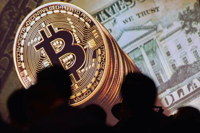 The Financial Conduct Authority warns people about the risk of investing in cryptocurrencies (Photo: ROSLAN RAHMAN/AFP via Getty Images)