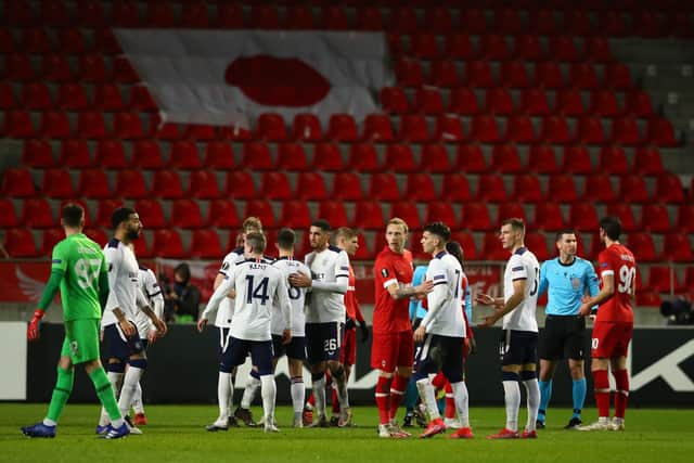 Players of both teams interact following the UEFA Europa League Round of 32 match between Royal Antwerp FC and Rangers FC at Bosuilstadion on February 18, 2021 in Antwerpen, Belgium. (Photo by Dean Mouhtaropoulos/Getty Images)