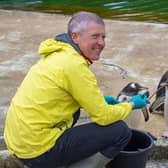 Willie Rennie meets some penguins at Edinburgh Zoo (Picture: Lisa Ferguson)
