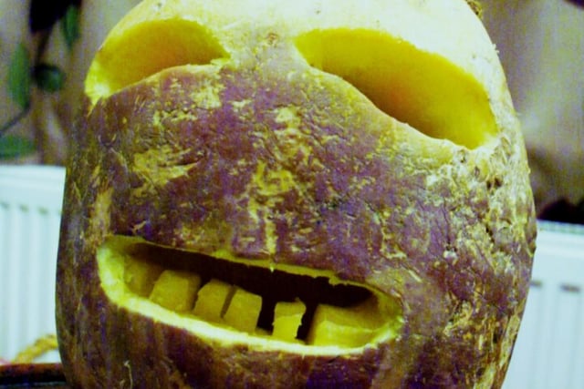 Unlike your usual pumpkin which has a zig-zag carve to resemble pointy teeth, it takes a lot more effort to craft this on a turnip due to the tough flesh, but since the shape already resembles a skull a few little teeth add a lot to its spooky value.