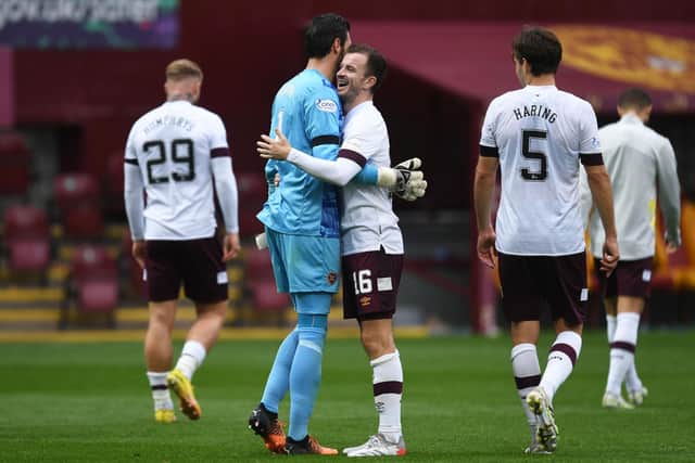 Hearts' Craig Gordon and Andy Halliday celebrate victory and a clean sheet against Motherwell. Photo by Ross MacDonald / SNS Group