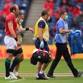 Lions captain Alun Wyn Jones leaves the field with a shoulder injury during the 1888 Cup match between the British & Irish Lions and Japan at BT Murrayfield.