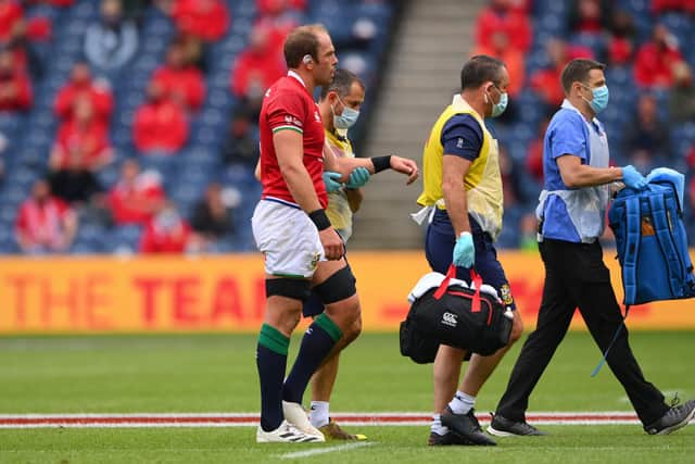 Lions captain Alun Wyn Jones leaves the field with a shoulder injury during the 1888 Cup match between the British & Irish Lions and Japan at BT Murrayfield.