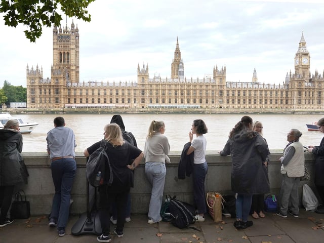 Members of the public join the queue on the South Bank, as they wait to view Queen Elizabeth II lying in state ahead of her funeral on Monday. Picture date: Wednesday September 14, 2022.