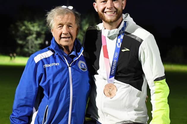 Josh Kerr with his first ever athletics coach, Eric Fisher. Picture: Gary Leek