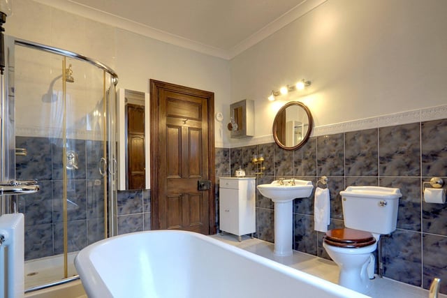 An ensuite with bath and shower