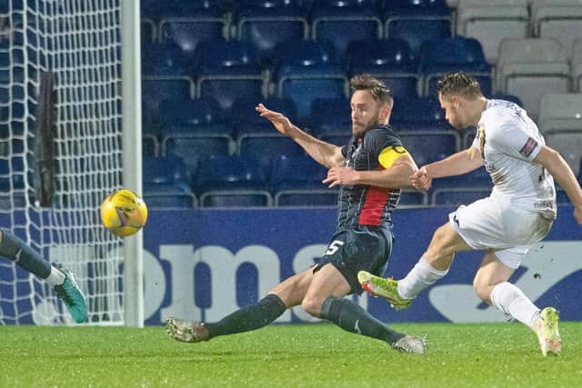 Livingston's Alan Forrest scores to make it 1-0 against Ross County. (Photo by Ross Parker / SNS Group)