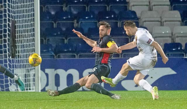 Livingston's Alan Forrest scores to make it 1-0 against Ross County. (Photo by Ross Parker / SNS Group)