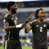 Dexter Lembikisa of Jamaica (right) celebrates with teammate Shamar Nicholson after scoring a wonder goal against Panama. (Photo by Ron Jenkins/Getty Images)