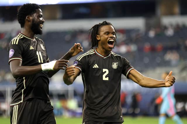 Dexter Lembikisa of Jamaica (right) celebrates with teammate Shamar Nicholson after scoring a wonder goal against Panama. (Photo by Ron Jenkins/Getty Images)