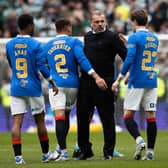 Celtic manager Ange Postecoglou shakes hands with Rangers' Scott Wright and James Tavernier following last weekend's derby. If they go on to win the league as his team snare the title he believes the presence of both in the Champions League next season would reflect well on the Scottish top flight. (Photo by Craig Williamson / SNS Group)