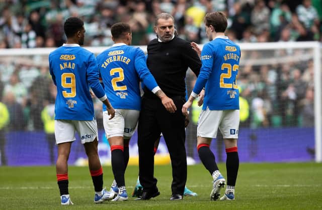 Celtic manager Ange Postecoglou shakes hands with Rangers' Scott Wright and James Tavernier following last weekend's derby. If they go on to win the league as his team snare the title he believes the presence of both in the Champions League next season would reflect well on the Scottish top flight. (Photo by Craig Williamson / SNS Group)