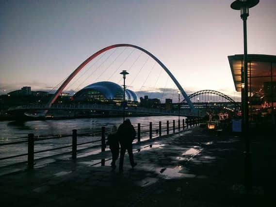 Gateshead Millennium Bridge, Sage Gateshead venue and the Tyne Bridge.