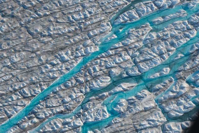 Rivers of meltwater carve into the Greenland ice sheet near the Sermeq Avangnardleq glacier (Picture: Sean Gallup/Getty Images)