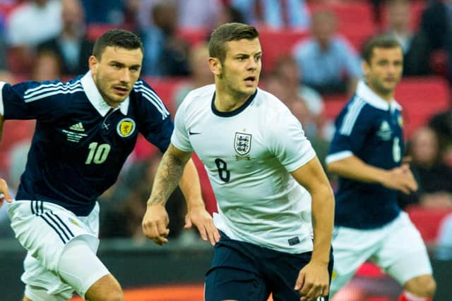 Jack Wilshere playing for England against Scotland at Wembley in 2013. Picture: SNS