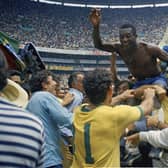 Pele is hoisted on the shoulders of his teammates after Brazil's 4-1 victory in the 1970 World Cup final against Italy (Picture: AP photo, file)