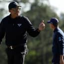 Phil Mickelson shows what it meant to him to birdie the last to close with a 65 in the 87th Masters. Picture: Patrick Smith/Getty Images.