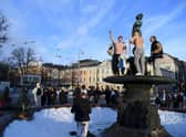 Ice hockey fans celebrate in Helsinki, after Finland's team won the Winter Olympic Games gold medal last year (Picture: Antti Aimo-Koivisto/Lehtikuva/AFP via Getty Images)