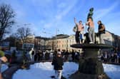 Ice hockey fans celebrate in Helsinki, after Finland's team won the Winter Olympic Games gold medal last year (Picture: Antti Aimo-Koivisto/Lehtikuva/AFP via Getty Images)
