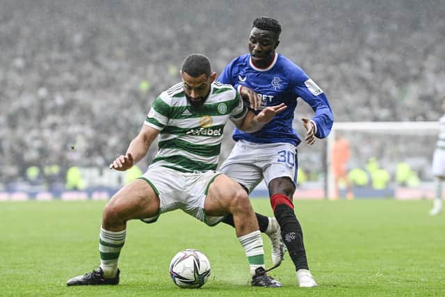 Celtic's Cameron Carter-Vickers holds off Rangers' Fashion Sakala Jr during the Scottish Cup semi-final.