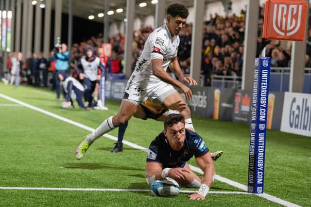 Damien Hoyland touched down in the corner to stretch Edinburgh's lead against Dragons. (Photo by Ross Parker / SNS Group)