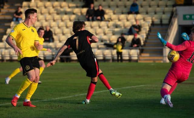 Alex Lowry, pictured scoring for Rangers B team against Dumbarton earlier this season, made a superb first team debut for the Ibrox club in their Scottish Cup win over Stirling Albion. (Photo by Mark Scates / SNS Group)