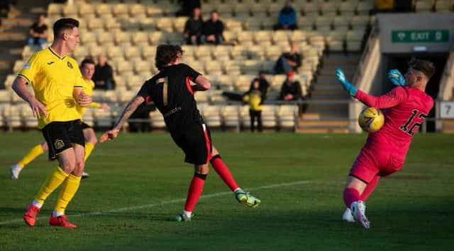 Alex Lowry, pictured scoring for Rangers B team against Dumbarton earlier this season, made a superb first team debut for the Ibrox club in their Scottish Cup win over Stirling Albion. (Photo by Mark Scates / SNS Group)