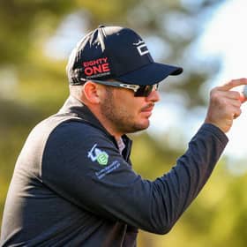 Ewen Ferguson shows his ball to a playing partner during the Rolex Challenge Tour Grand Final supported by the R&A at T-Golf & Country Club in Mallorca. Picture: Octavio Passos/Getty Images.