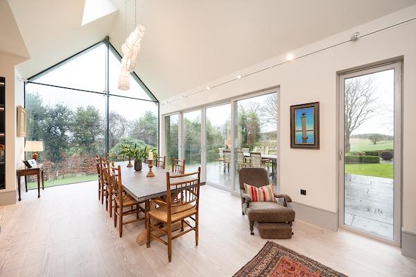 Generous and light traditional rooms offer a wealth of period features while the stylish and bright contemporary kitchen has been carefully designed to blend seamlessly with the original stonework, while simultaneously taking advantage of modern glazing.