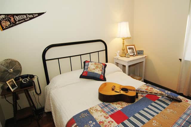 Elvis's teenage bedroom at Lauderdale Courts, Memphis, his former two-bedrom family home where visitors can stay overnight. 
Pic: Andrea Zucker/Elvis Presley Enterprises