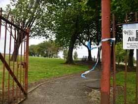 Police tape near where the tragic discovery was made in Rae Street area of Stenhousemuir