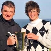 Paul Lawrie presented David Law with the trophy after his win in the 2009 Scottish Boys' Championship at Royal Aberdeen. Picture: Scottish Golf