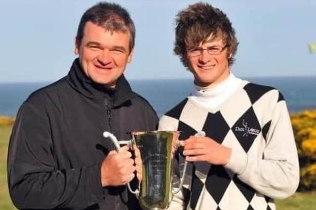 Paul Lawrie presented David Law with the trophy after his win in the 2009 Scottish Boys' Championship at Royal Aberdeen. Picture: Scottish Golf
