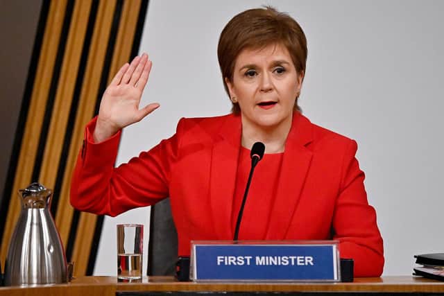 First Minister Nicola Sturgeon taking oath before giving evidence to the Committee on the Scottish Government Handling of Harassment Complaints, at Holyrood in Edinburgh, examining the handling of harassment allegations against former first minister Alex Salmond.