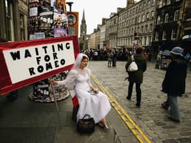 Street entertainers perform on the Royal Mile as part of the Edinburgh Festival Fringe  (Picture: Jeff J Mitchell/Getty Images)