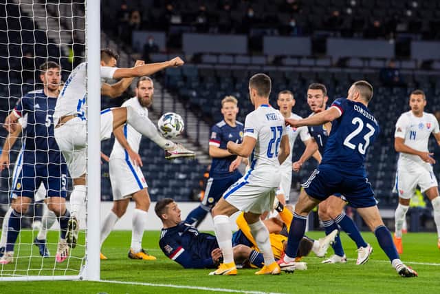 Andrew Considine, who was making his international debut aged 33, is involved in the action as Scotland host Slovakia in their Nations League fixture (Photo by Alan Harvey / SNS Group)